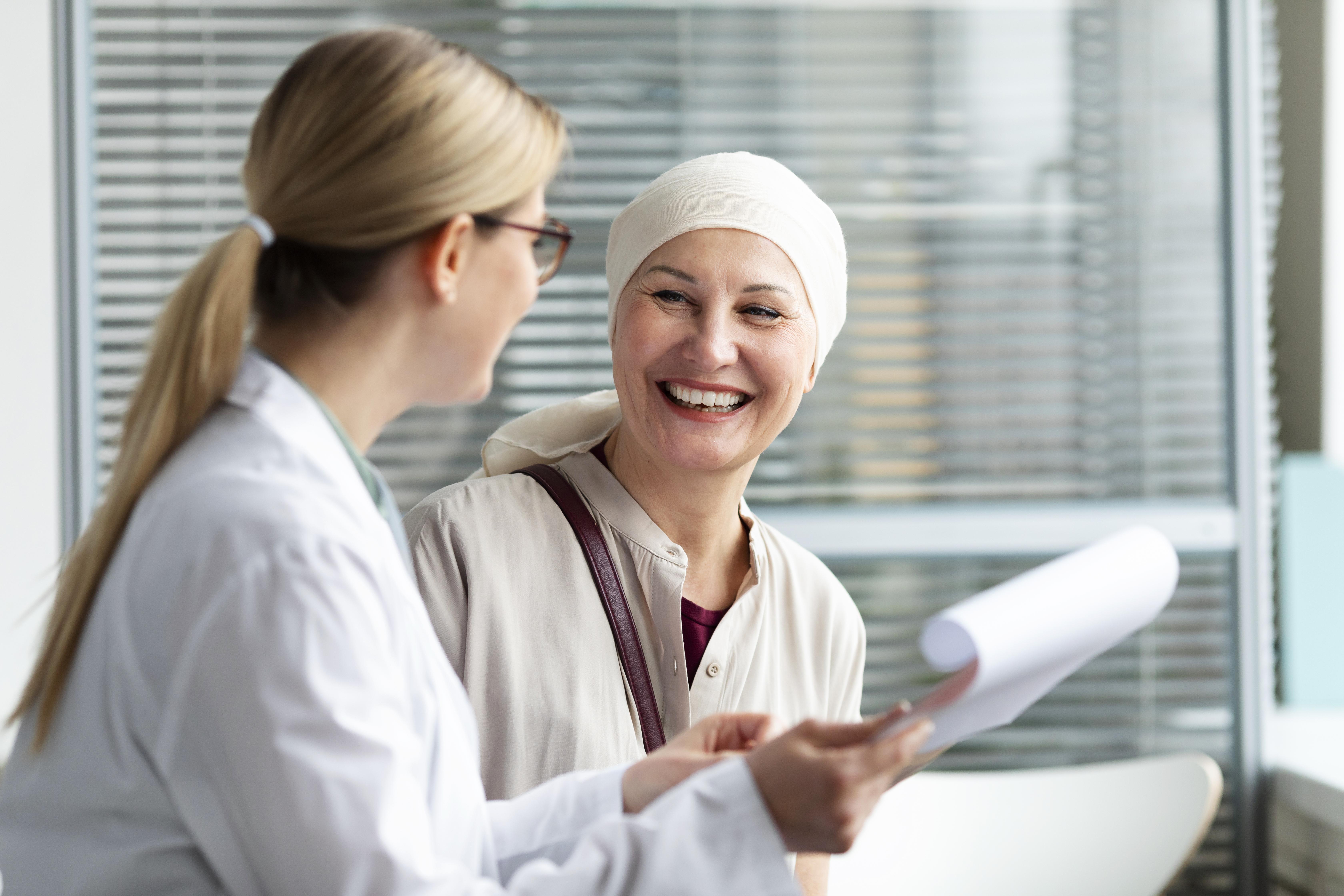 middle-aged-woman-with-skin-cancer-talking-with-her-doctor-68d401b0636bb492396892.jpg
